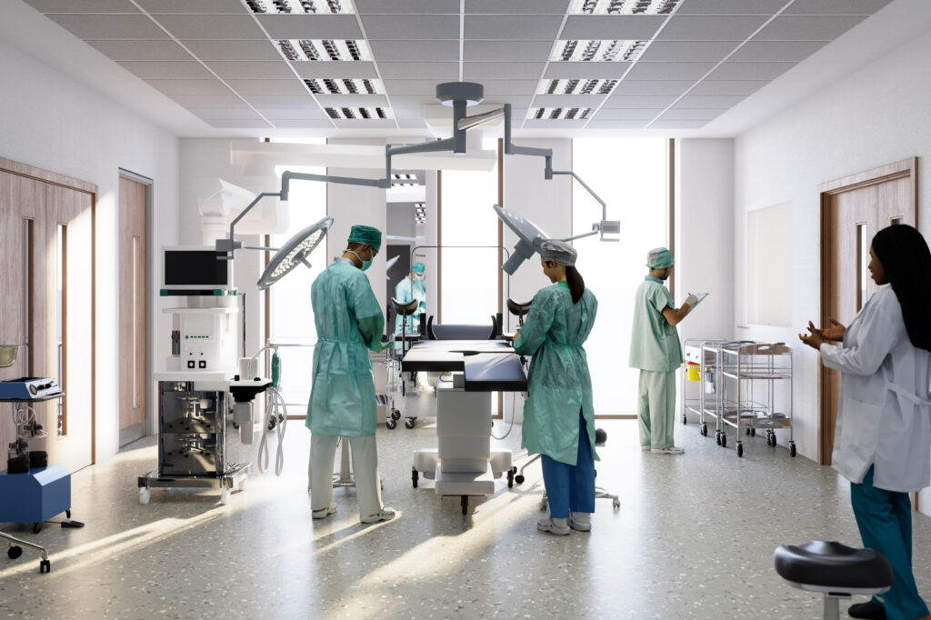 Doctors and Nurses stood in an operating room.