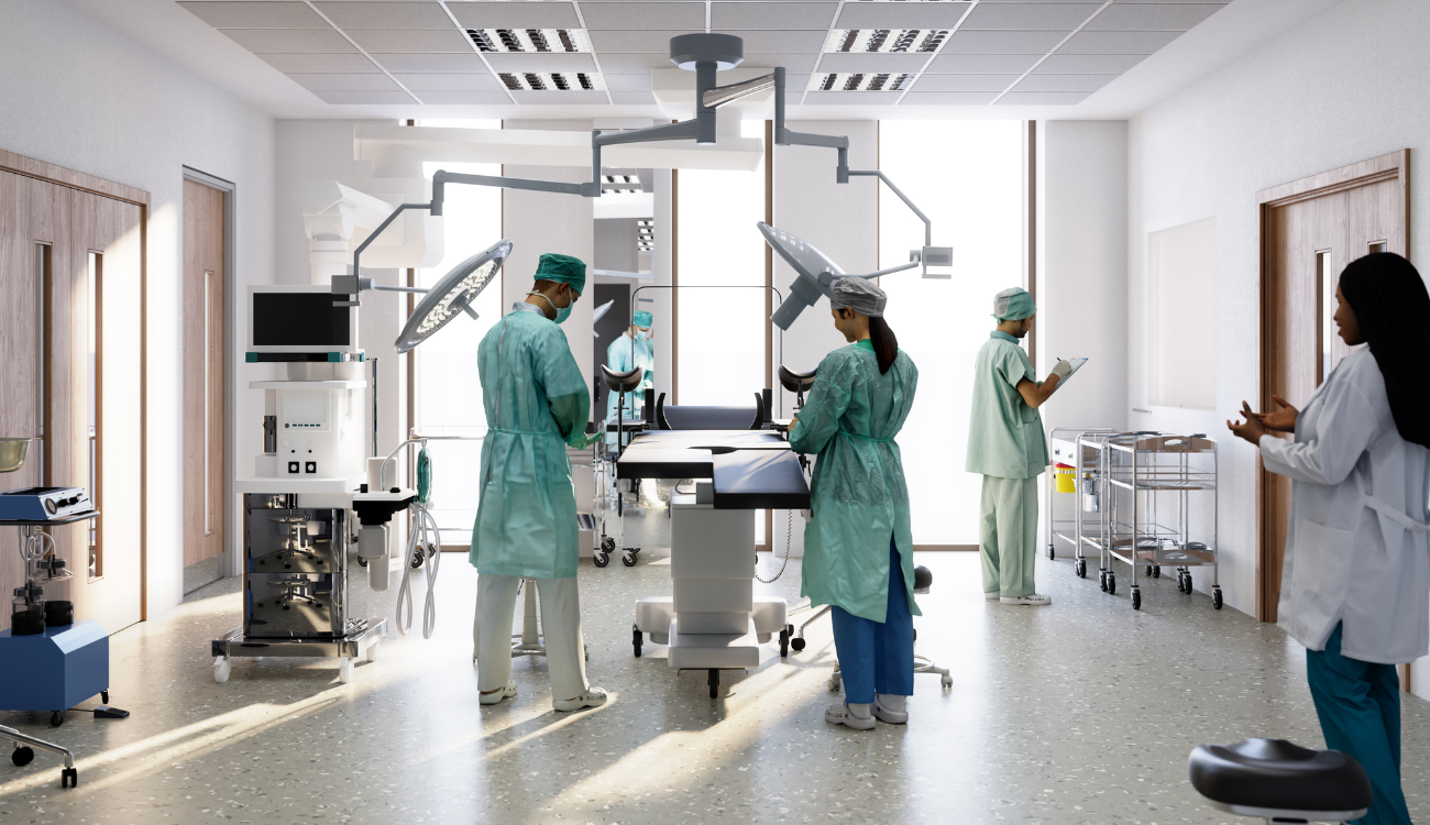 Doctors and Nurses stood in an operating room.